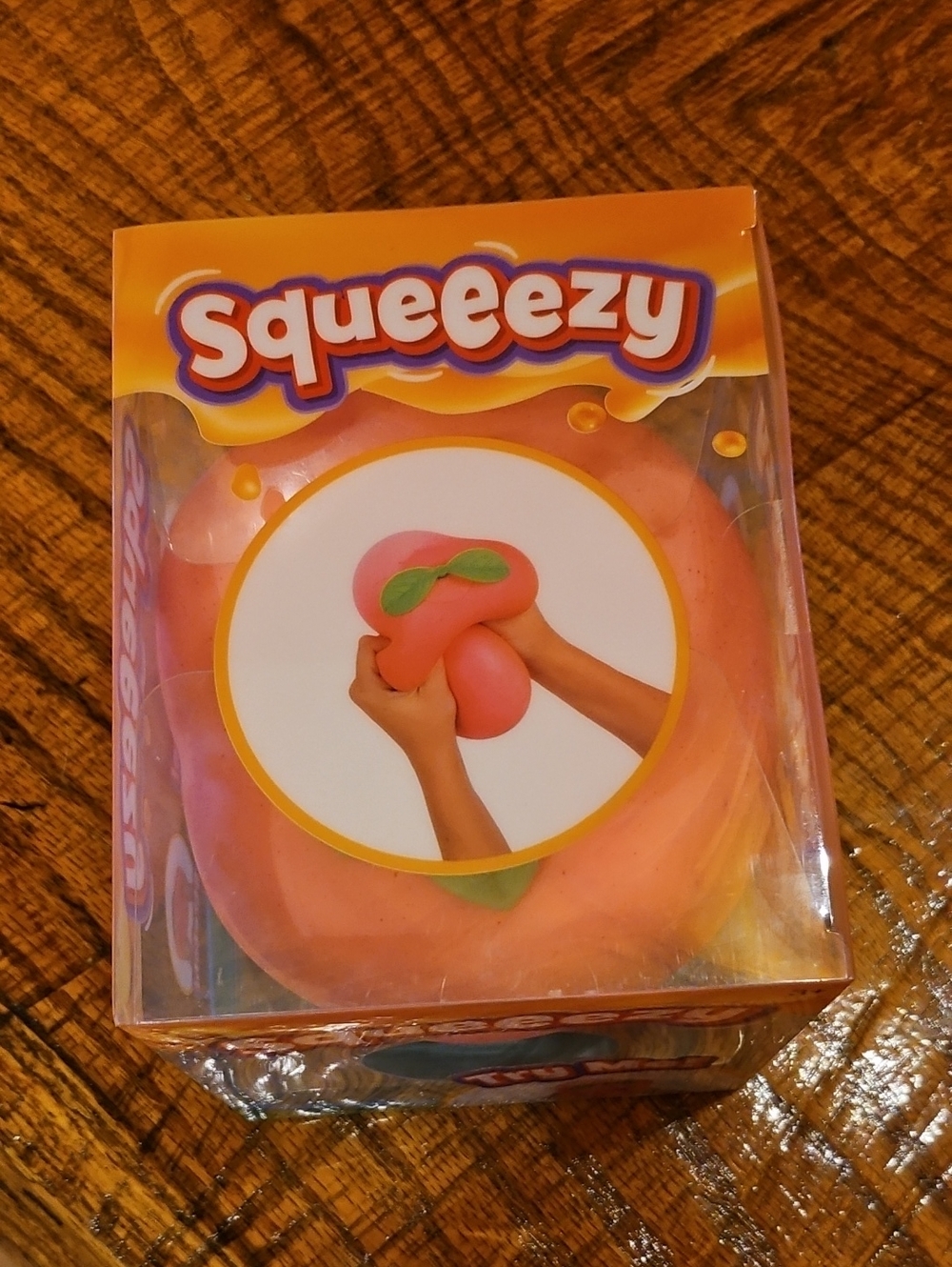 VIRAL Squeeezy Pink Peach Squeeze Ball.
